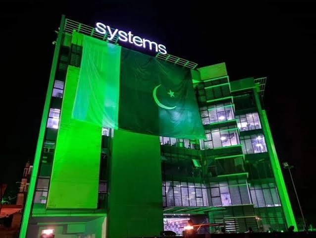 Systems Limited building with Pakistan flag
